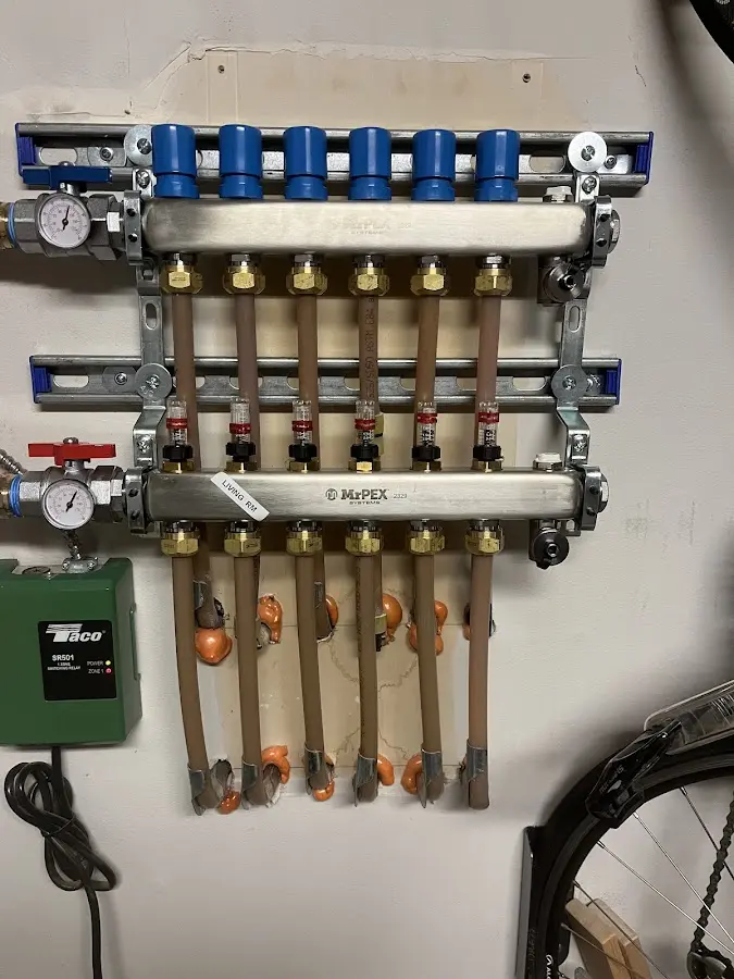 Plumber performing Gas Line Installation at a residential property in Higginsville