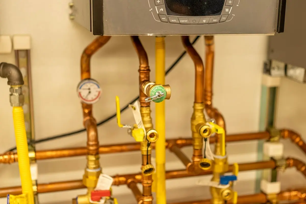 Licensed technician providing Backflow Prevention for a homeowner in Higginsville